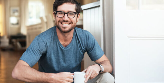 Man sitting with glasses on