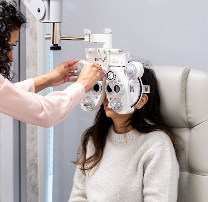 OCL consultant testing a patient's eyes